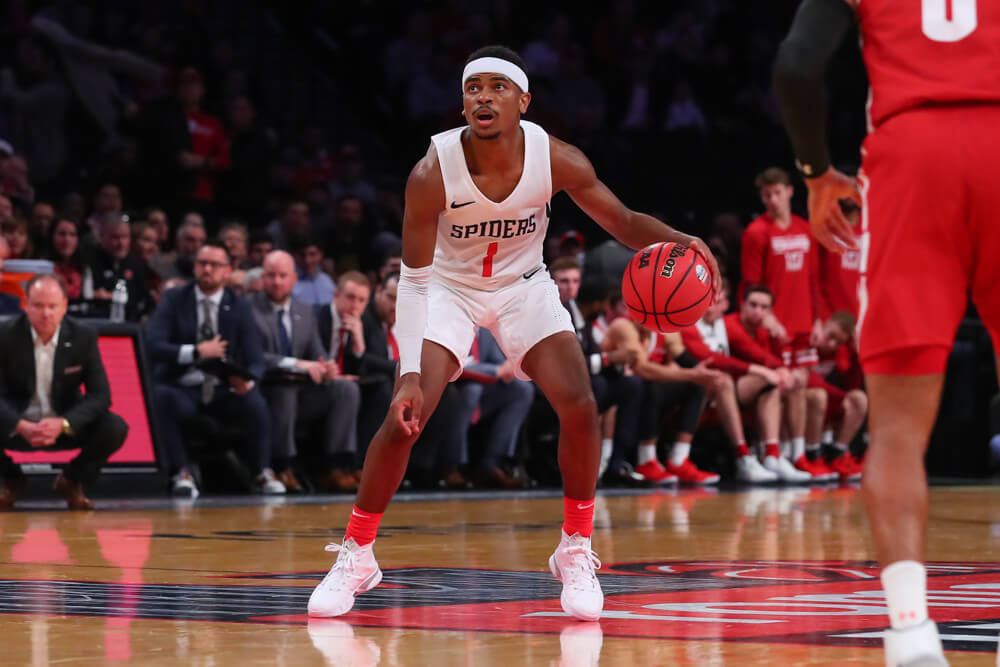 Richmond Spiders guard Blake Francis dribbling