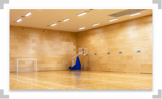 Basketball net in an empty gym
