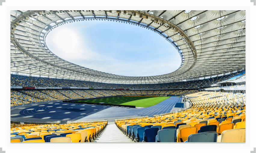 Large empty stadium with open roof