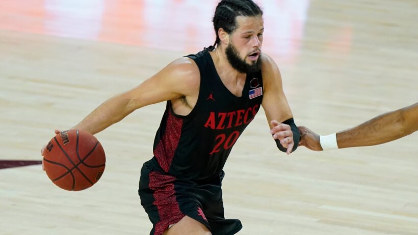 San Diego State guard Jordan Schakel dribbles the ball