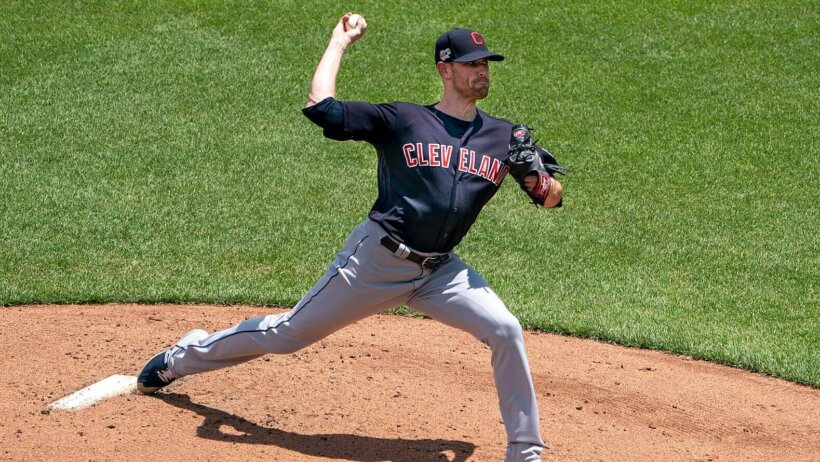Shane Bieber delivering pitch