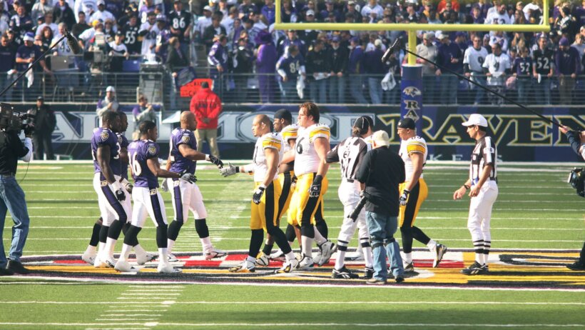 Steelers and Ravens shaking hands