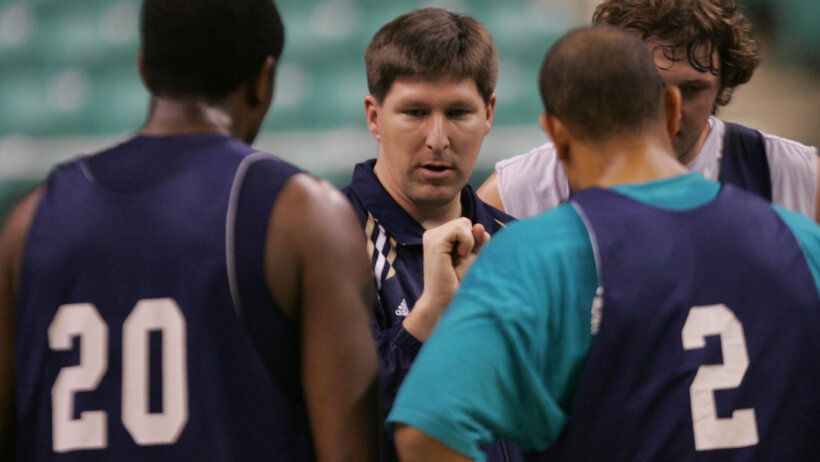 UNC Wilmington coach Brad Brownell talks with his players