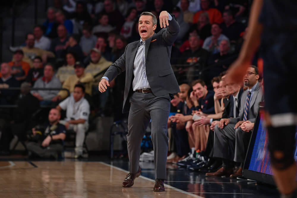 Tony Bennett running on the Virginia sideline
