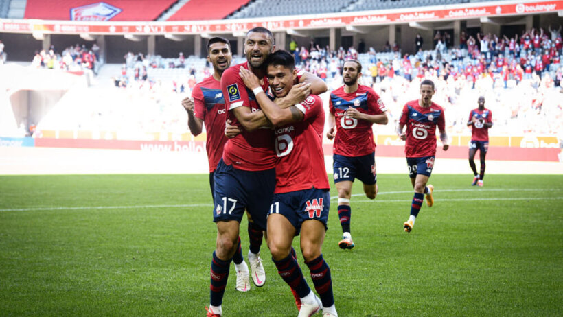 Luiz Araujo, right, and Burak Yılmaz celebrate a Lille goal.