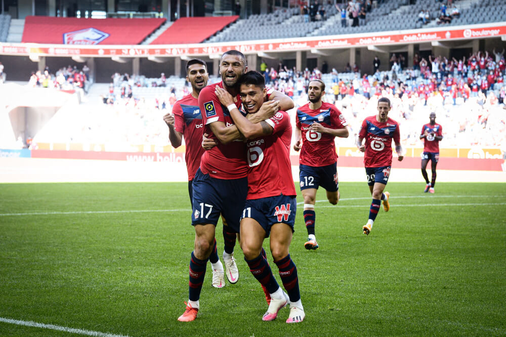 Luiz Araujo, right, and Burak Yılmaz celebrate a Lille goal.