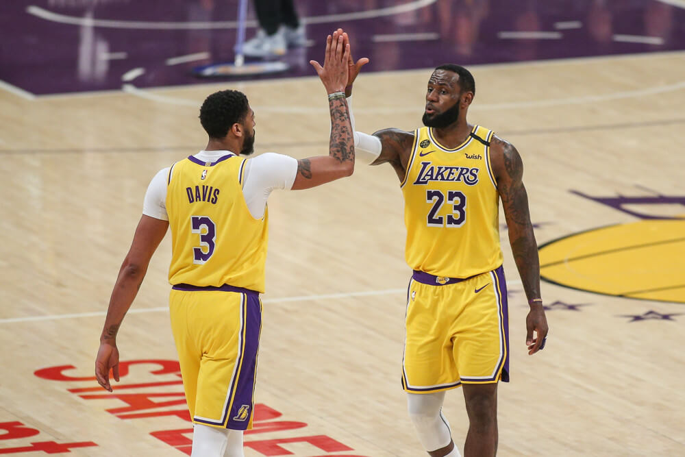 Anthony Davis and LeBron James hi-five each other