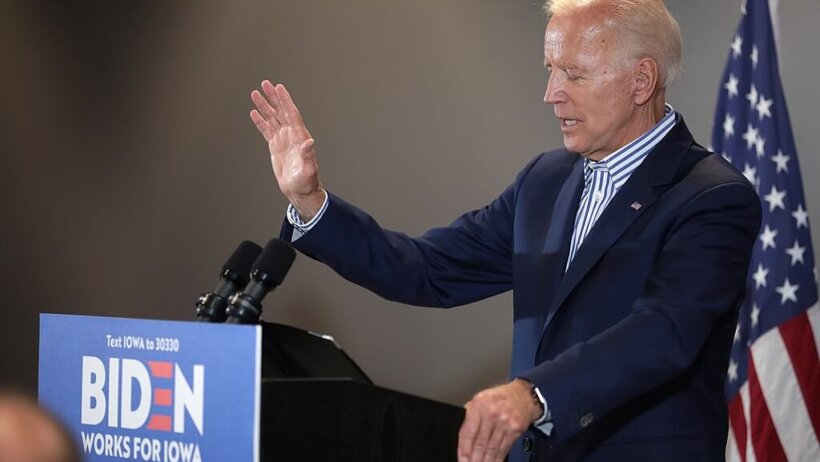 Joe Biden speaking at a podium