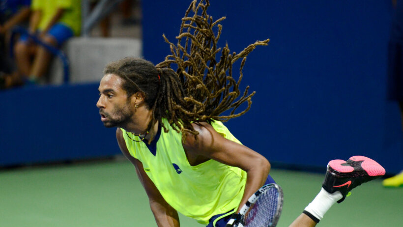 Dustin Brown serving the ball