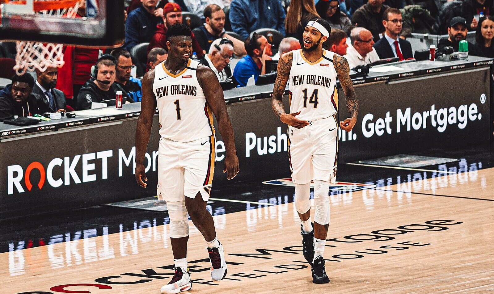 Zion Williamson and Brandon Ingram walking