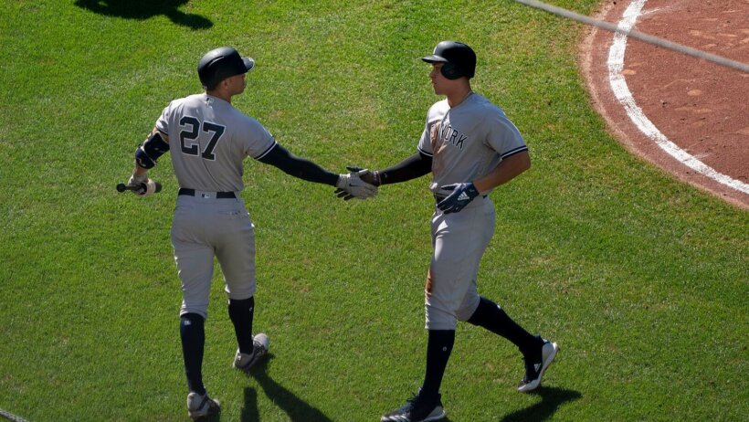 Giancarlo Stanton and Aaron Judge Judge celebrating a home
