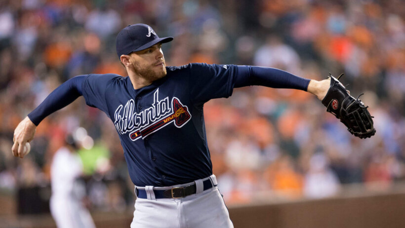 Freddie Freeman throwing baseball