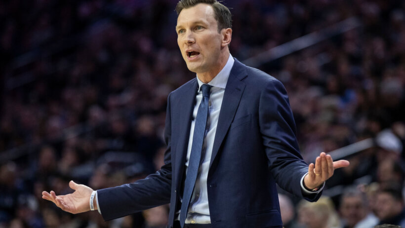 Baker Dunleavy arms out to side surprised reaction