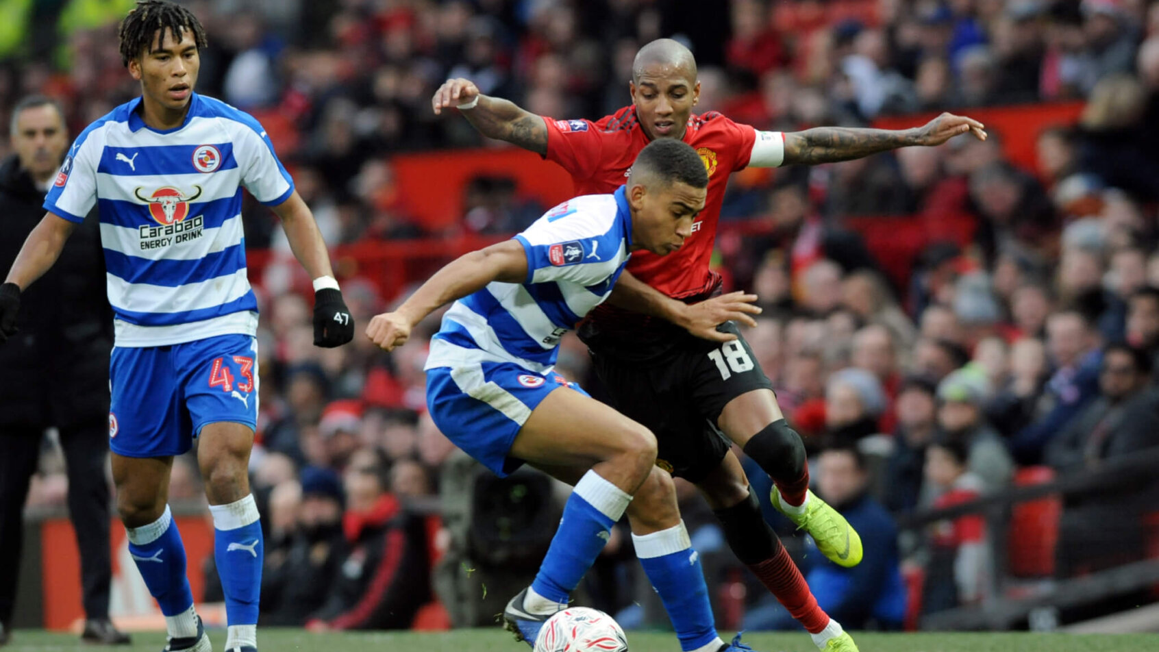 Andy Rinomhota fights off defender