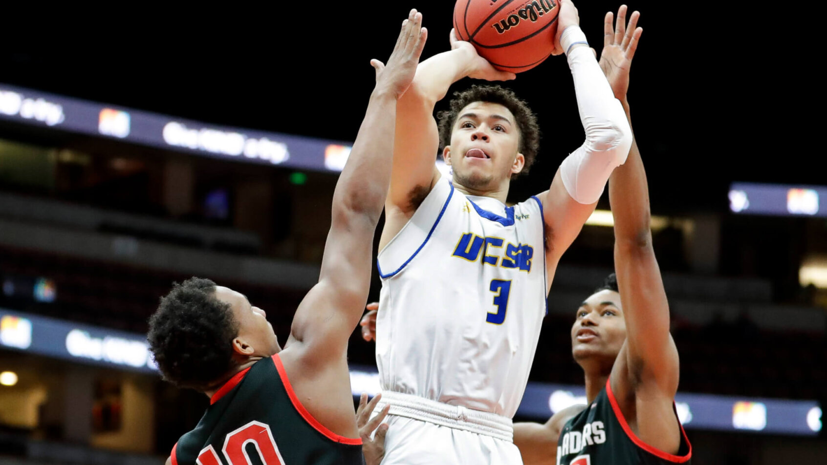 JaQuori McLaughlin shooting over defender