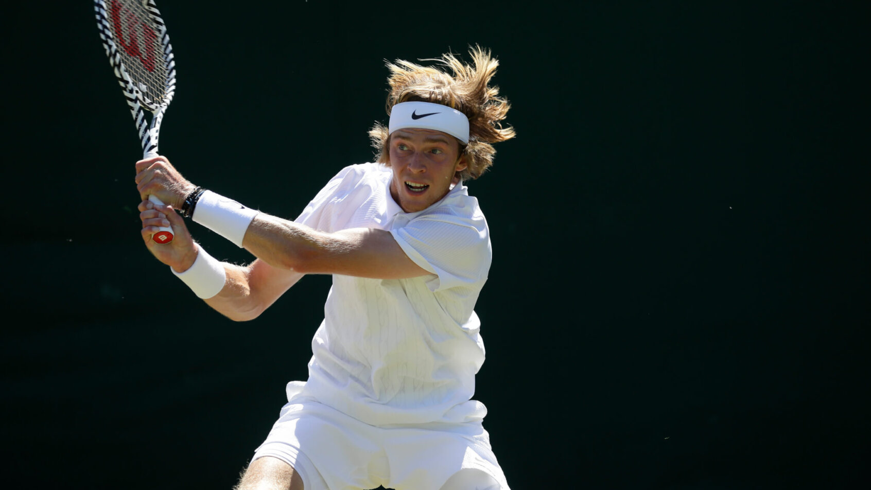 Andrey Rublev smacks a backhand