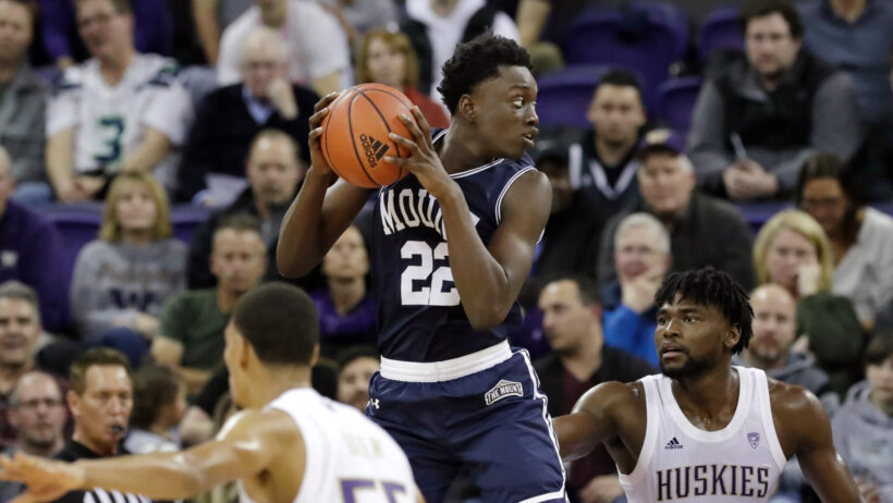 Mount St. Mary's Nana Opoku looks to pass the ball