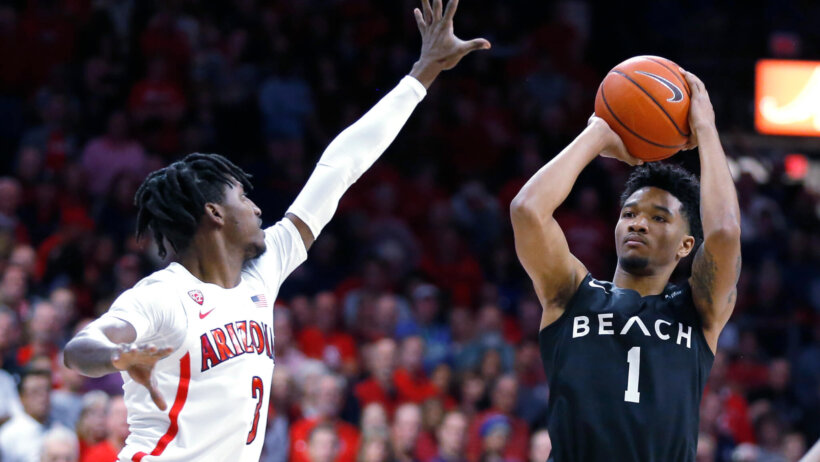Long Beach State guard Michael Carter III shoots