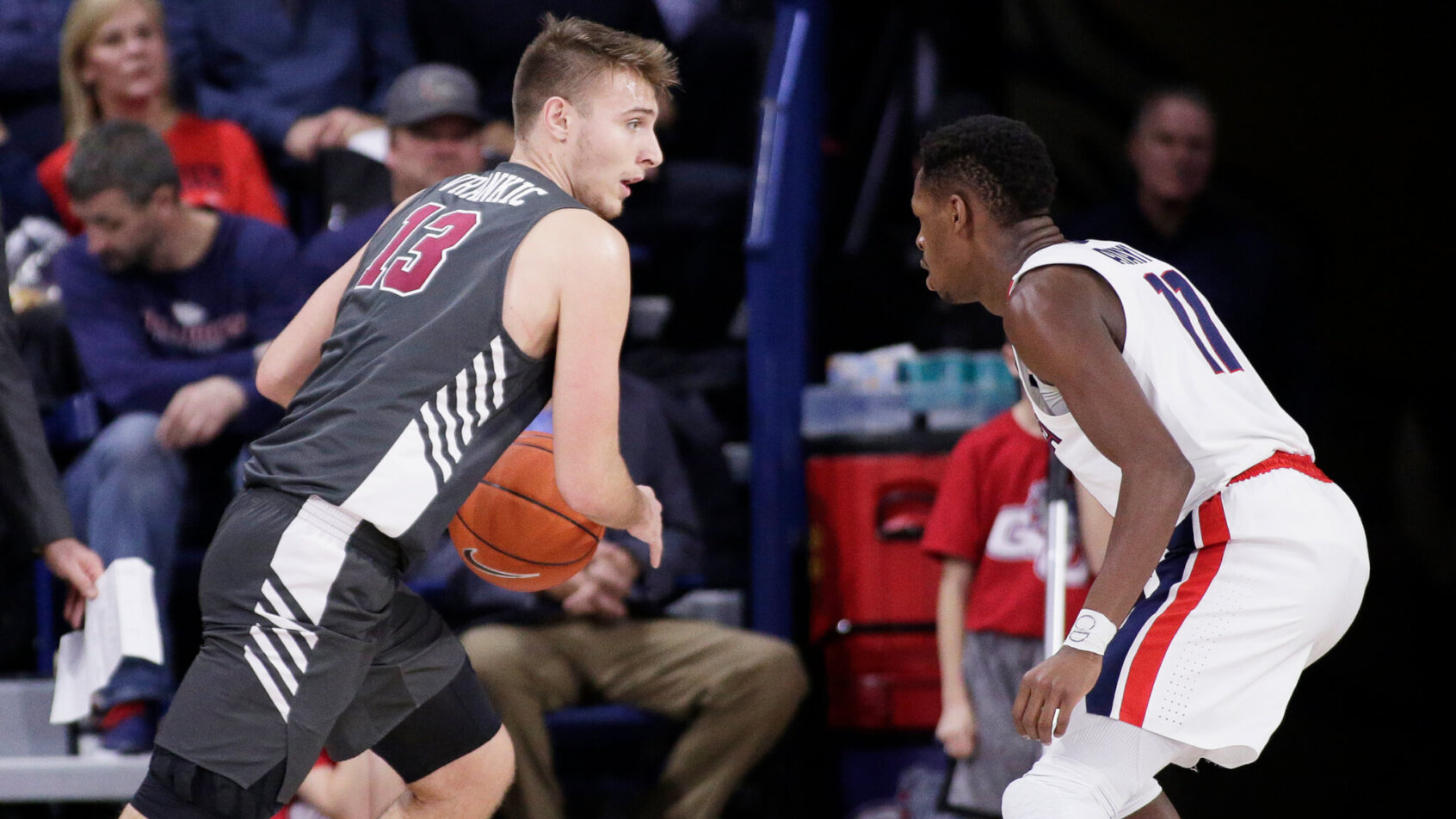 Josip Vrankic looks to drive by defender