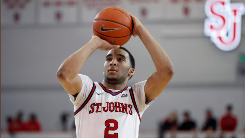 Julian Champagnie shooting basketball