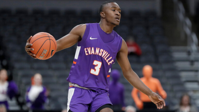 Evansville's Jawaun Newton brings the ball down the court