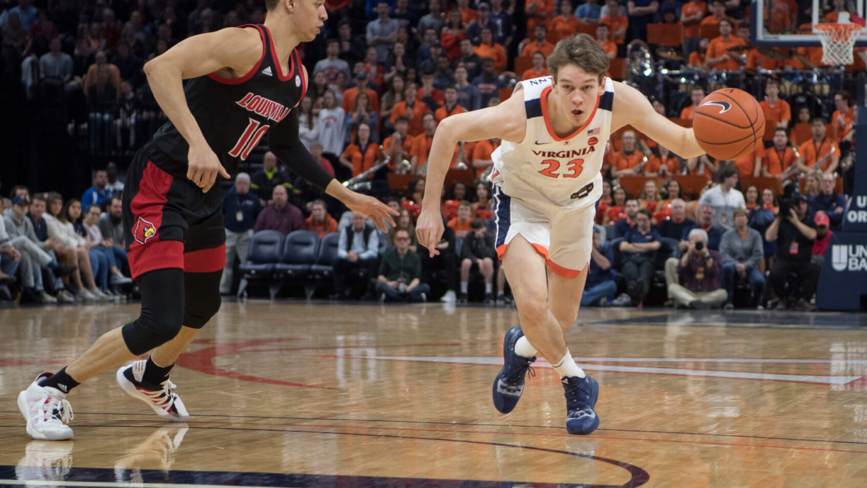 Kody Stattmann dribbling while being defended