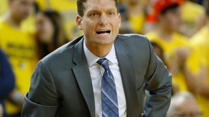Luke Yaklich hand on hip