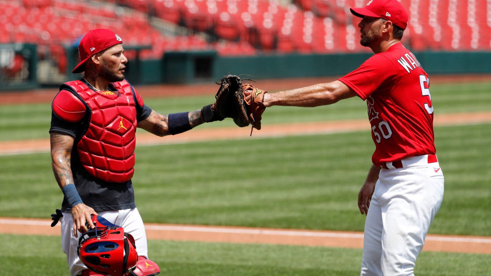 Adam Wainwrigh and Yadier Molina fist bump