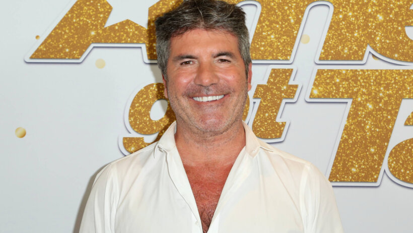 simon cowell smiling