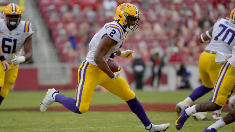 Arik Gilbert running with football