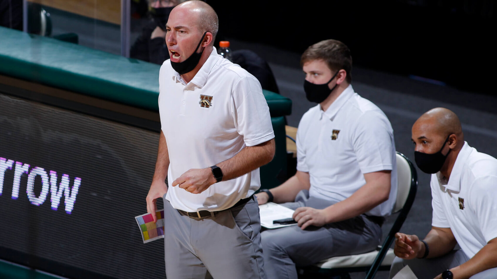 Clayton Bates mask down, yelling instruction