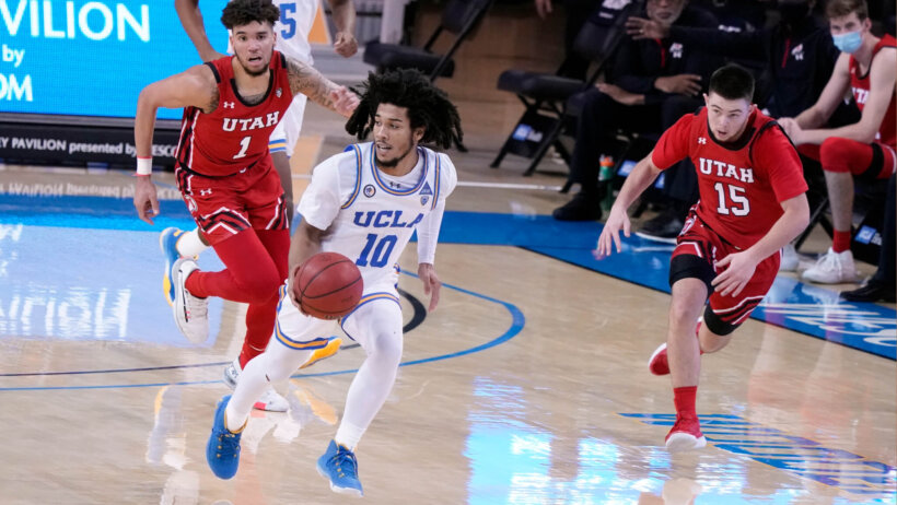 Tyger Campbell dribbling in open court