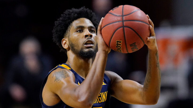 West Virginia guard Taz Sherman shooting a shot during a college basketball game.