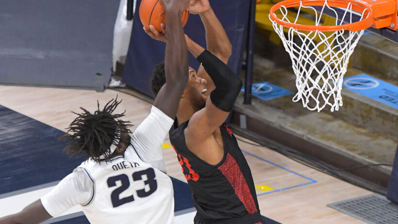 Neemias Queta blocks shot