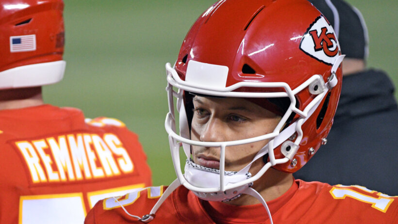 A close up shot of Kansas City Chiefs quarterback Patrick Mahomes with his helmet on.