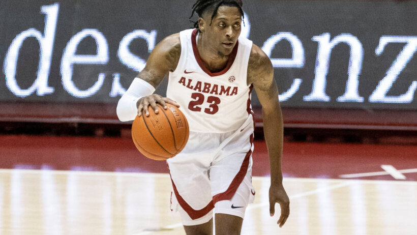 John Petty Jr. dribbling
