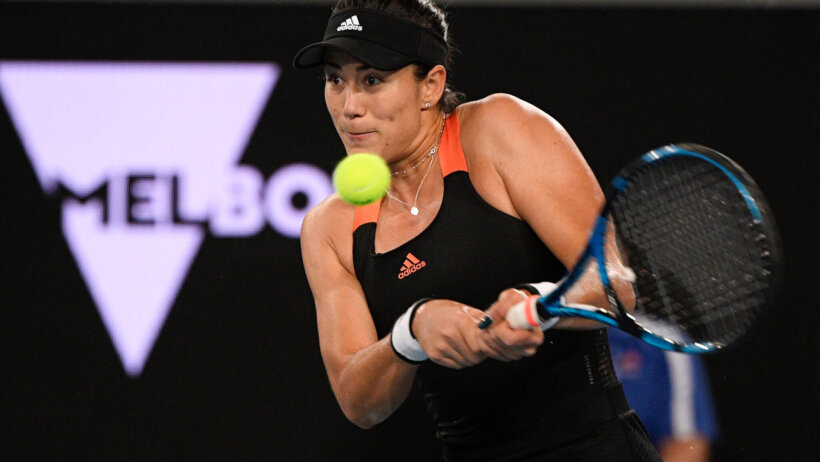 Spain's Garbine Muguruza hitting a backhand return in a match.