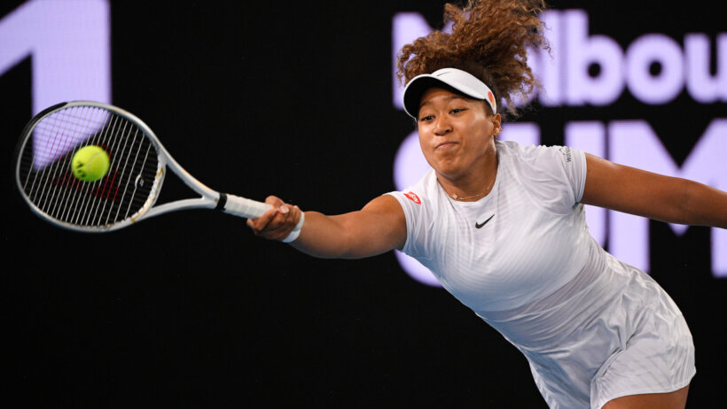Japan's Naomi Osaka stretches for a forehand return during a match.