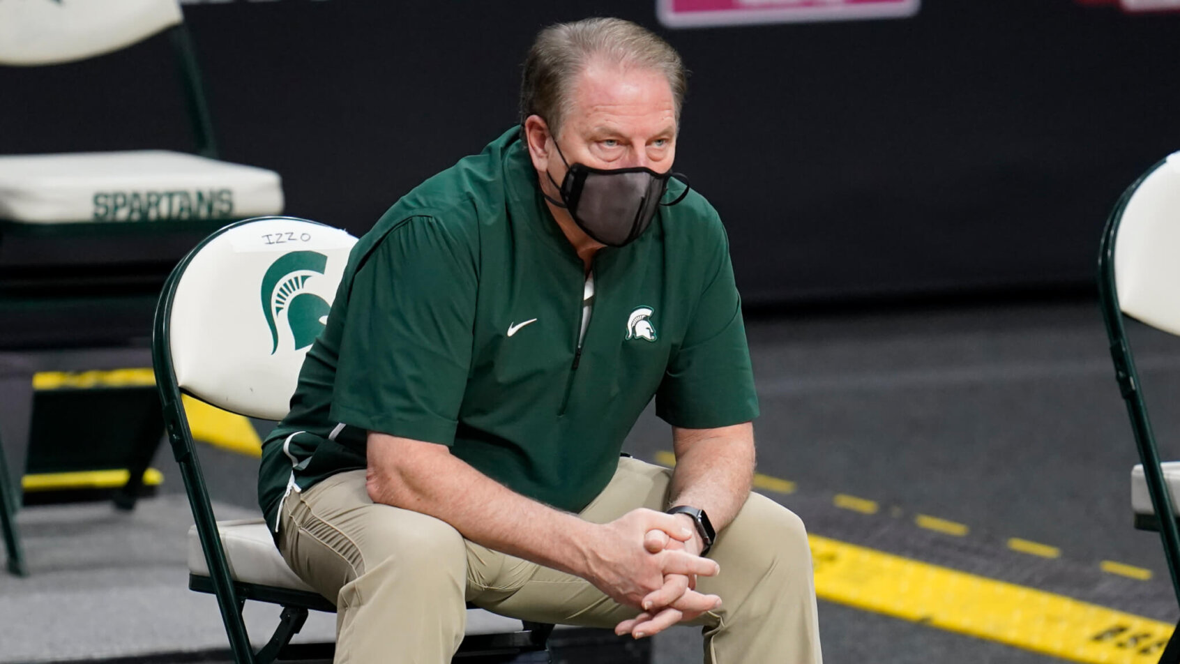 Tom Izzo sitting with mask on