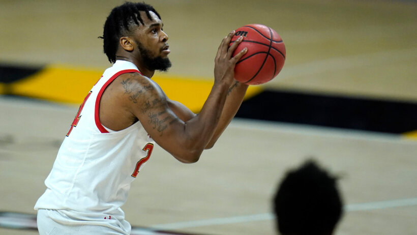 Maryland forward Donta Scott shooting a shot in a NCAA men's basketball game.