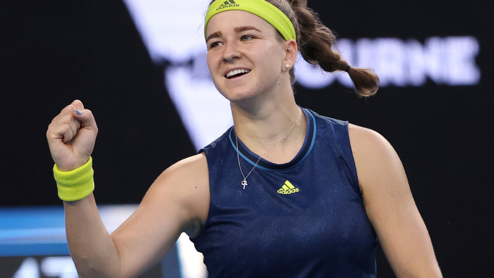 Karolina Muchova celebrating a win with a firstbump at the 2021 Australian Open.