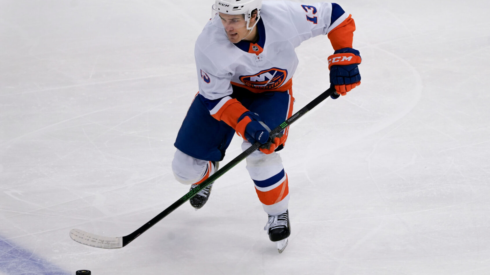 New York Islanders' Mathew Barzal skating on the ice during a NHL game.