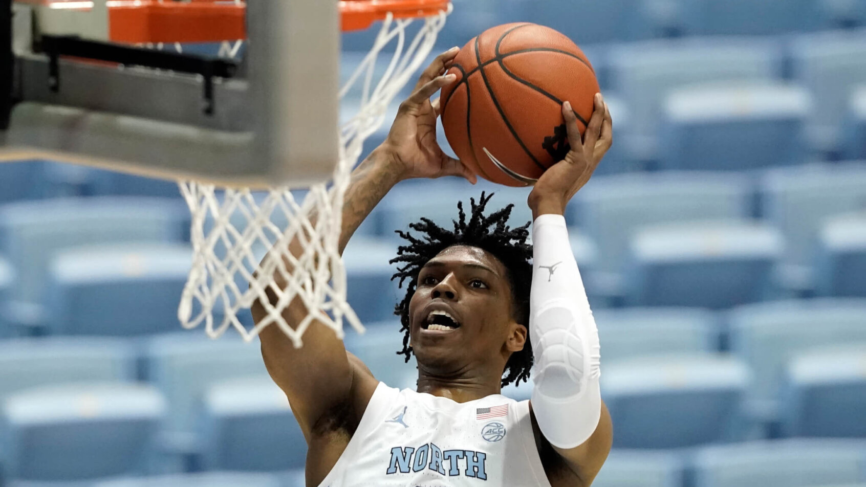 Caleb Love shooting at the rim