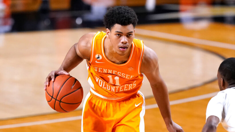 Tennessee's Jaden Springer dribbling the ball on offense during a NCAA men's basketball game.