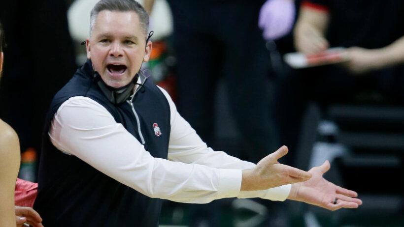 Chris Holtmann mask down yelling with officials
