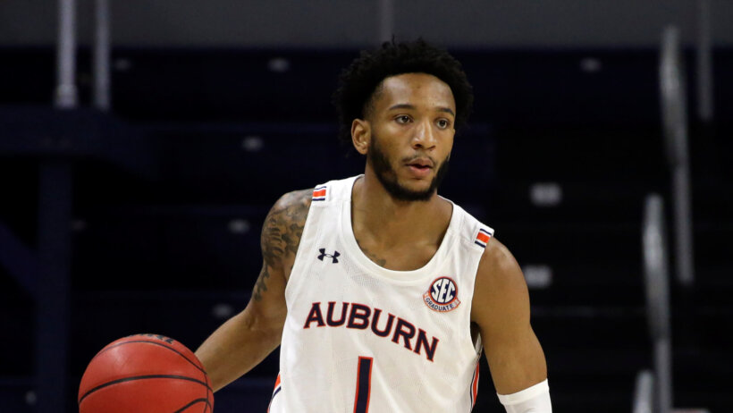 Jamal Johnson dribbling ball