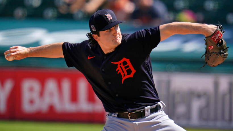 Casey Mize throws a pitch