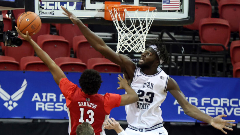 Neemias Queta contesting shot at the basket