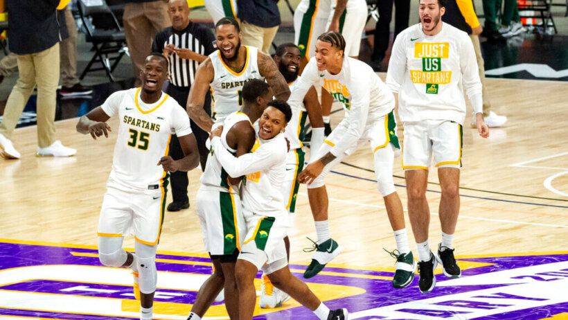 Norfolk State players celebrate after beating Morgan State