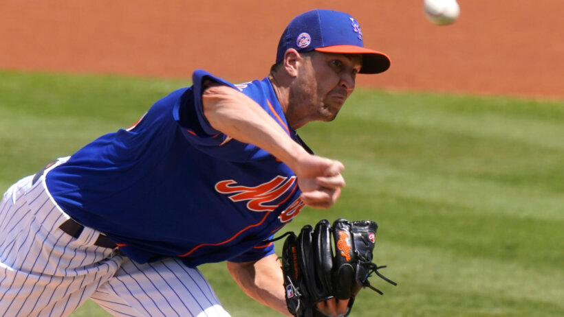 Jacob deGrom delivers a pitch